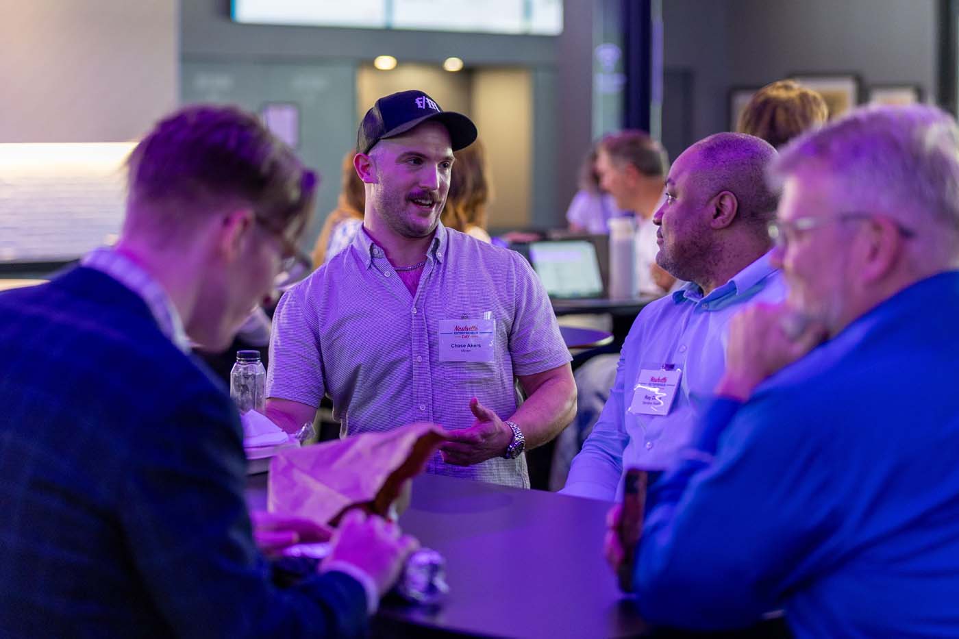 Healthcare founder demonstrating their product to an attendee