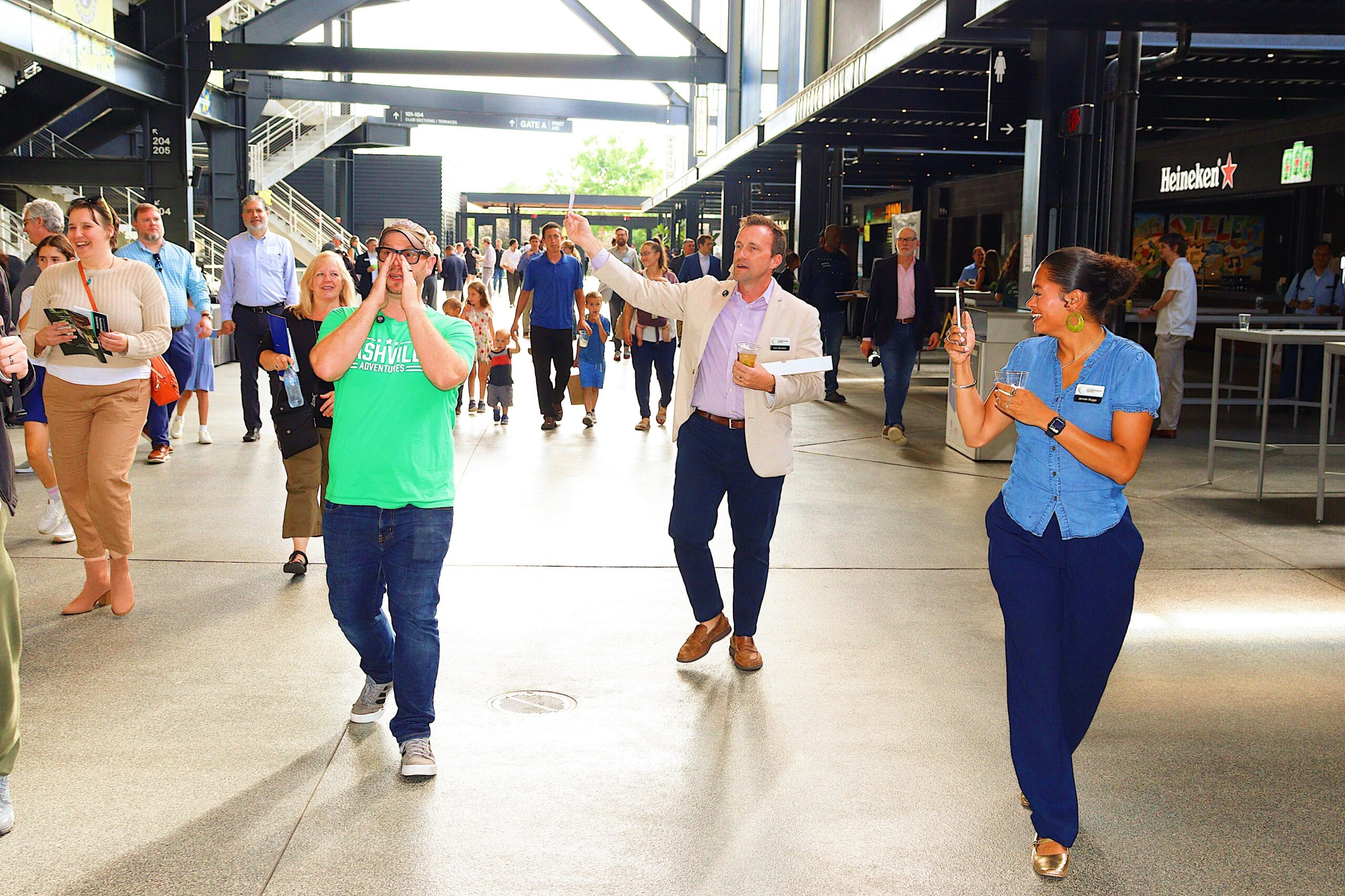Sam Davidson talking with founders on the GEODIS concourse
