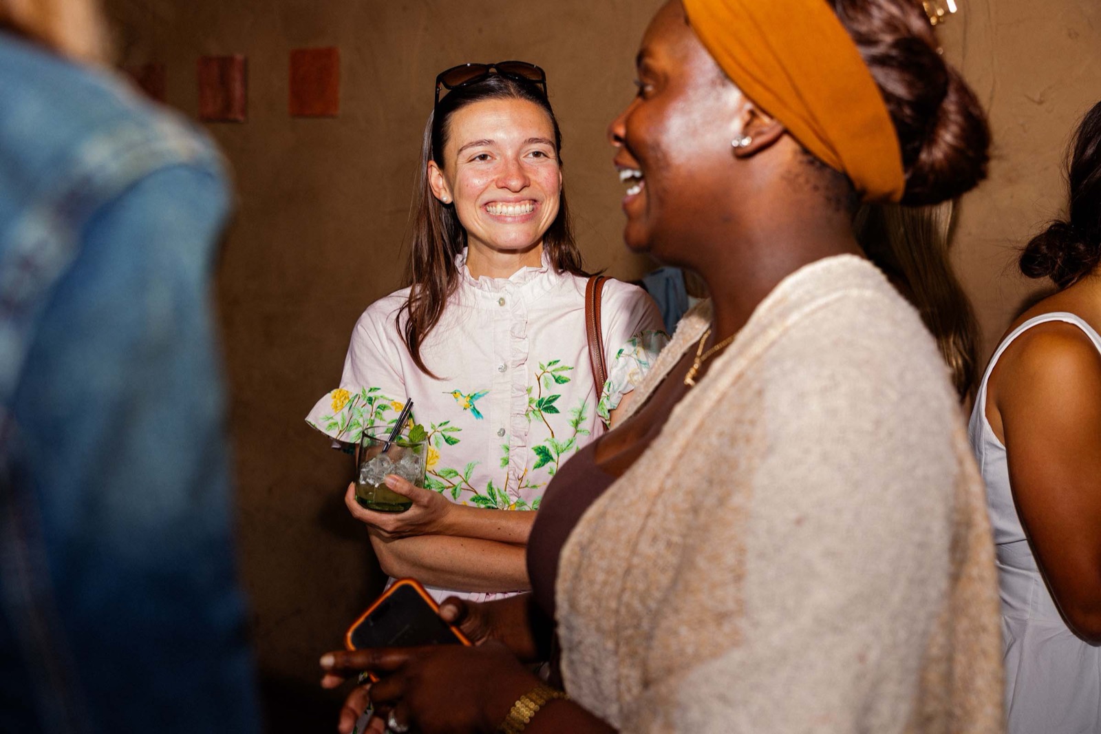 Two women founders connecting at the Women Founders happy hour