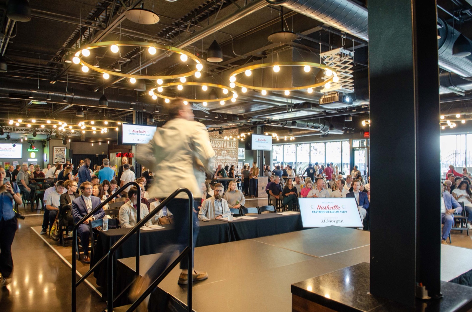 The stage and a full audience at Nashville Entrepreneur Day, seen from the side