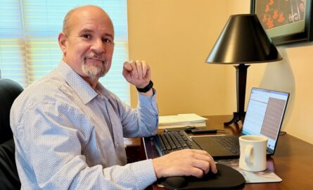 Tarak Robbana, founder of VerbaPost, at his desk